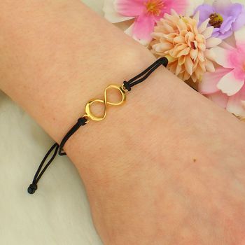 Bransoletka sznurkowa czarna z pozłacaną nieskończonością – symbol trwałości..jpg